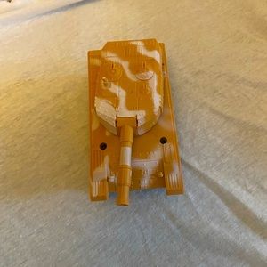 This tank is a greenbrier tank that is tan and white